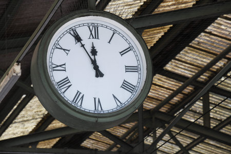Ettlingen, Baden-Wurttemberg / Germany - May 18, 2018: clock shows five minutes to twelveのeditorial素材