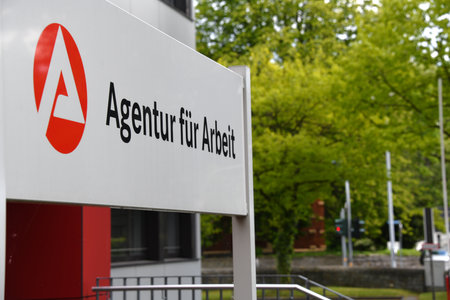 Soest, North Rhine-Westphalia, Germany - May 12, 2019: Signpost with the logo of a Job Center - Agentur fÃ¼r Arbeit, the state owned employment agency in Soest, Germanyのeditorial素材