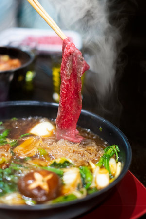 Japanese hot pot with beef and vegetables, close-up, selective focusの写真素材