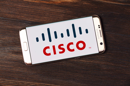 Kazan, Russian Federation - Aug 5, 2018: sign on the wall of the Cisco Systems GmbH office. Cisco...