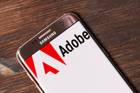 Kazan, Russian Federation - Aug 5, 2018: Adobe Systems Logo. Adobe is a multinational software company that produces and sells multimedia and creativity software.のeditorial素材