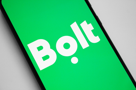 RUSSIA, KAZAN MAY 1, 2019: Bolt Taxify. Transport platform Bolt logo on a white background on the smartphone screenのeditorial素材