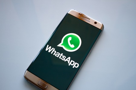 Kazan, Russian Federation - Jun 15, 2018: WhatsApp logo on smartphone screen. WhatsApp is an instant messaging service and application. Illustrative editorial.のeditorial素材
