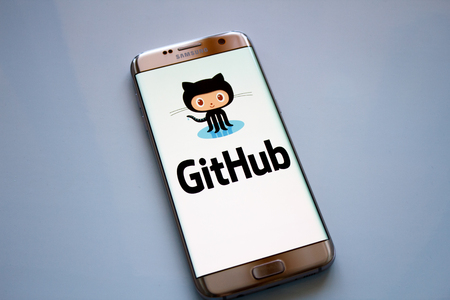 Kazan, Russian Federation - Jun 15, 2018: GitHub website on smartphone. GitHub is a web-based Git repository hosting service.のeditorial素材