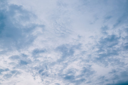 Abstract dramatic clouds on a blue sky background