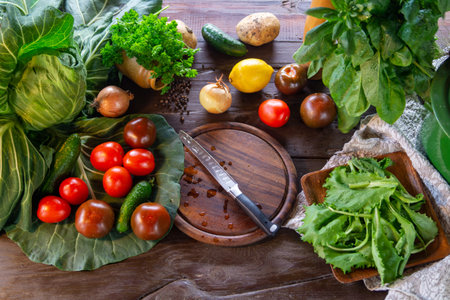 Fresh vegetables and herbs on a wooden background. Healthy eating concept.の写真素材