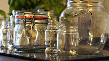 Glass jars on the kitchen counter. Close-up. Selective focus.の写真素材