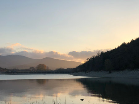Sunset at the lake in winterの写真素材