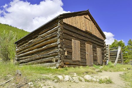 Old log cabin in abandoned mining town, western USAのeditorial素材