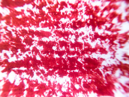 Smeared lipstick, abstract red background