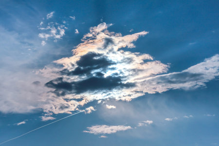 The sun behind a thundercloud, beautiful cloud