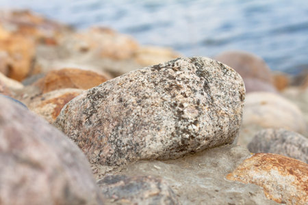 The stones on the embankment, one in focusの写真素材
