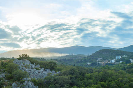 Sunset in the Crimea, Alushta, Utes. Mountains and forest in fog.の写真素材