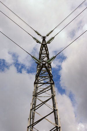 a pylon with cloudy sky background