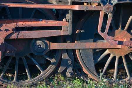 rusted wheels of an old locomotive