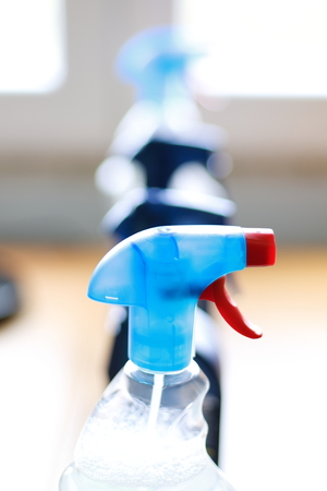 Spray bottle of disinfectant household cleaners.の写真素材