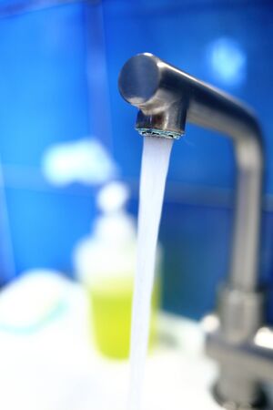 Washbasin tap with stainless steel wasteの写真素材