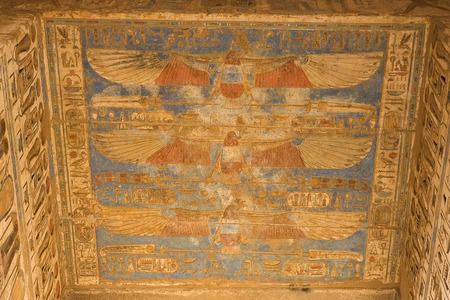 Egyptian hieroglyphs and drawings on the walls and columns. Egyptian language, The life of ancient gods and people in hieroglyphics and drawingsのeditorial素材