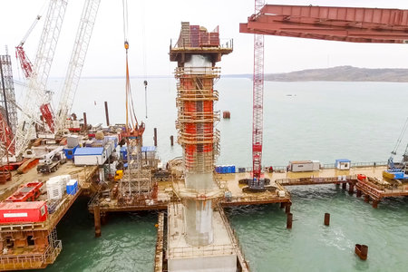 Construction of the bridge. Engineering facilities for the construction of a railway and automobile...