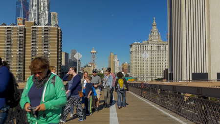 New York, USA - June 20, 2015: Walking through the streets of New York, Manhattan. The life of New York in the afternoon. Streets and city buildings.のeditorial素材