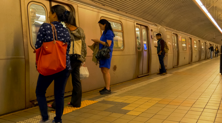 New York, USA - June 20, 2015: Metro in New York, Walking through the streets of New York, Manhattan. The life of New York in the afternoon. Streets and city buildings.のeditorial素材