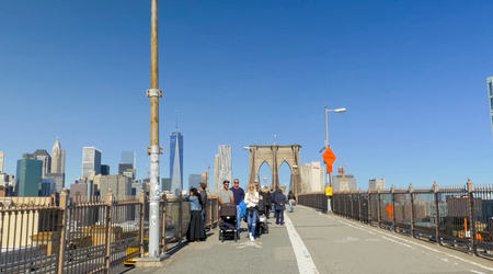 New York, USA - June 20, 2015: The Brooklyn Bridge. Walk on the bridge. Walking through the streets of New York, Manhattan. The life of New York in the afternoon. Streets and city buildings.のeditorial素材