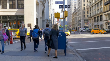 New York, USA - June 20, 2015: Walking through the streets of New York, Manhattan. The life of New...