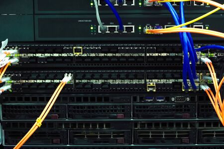 A working server. Internet wires and flashing lights on the server.の写真素材