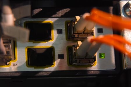 A working server. Internet wires and flashing lights on the server.の写真素材