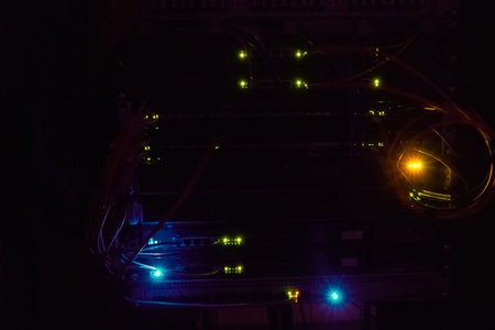 A working server. Internet wires and flashing lights on the server.