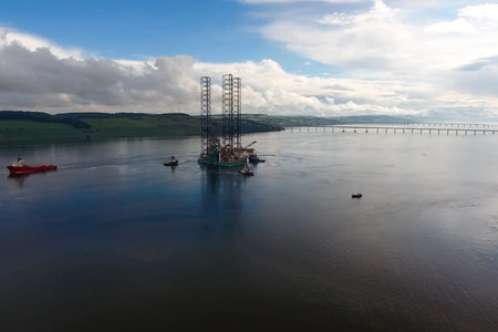 Drilling platform in the port. Towing of the oil platform.
