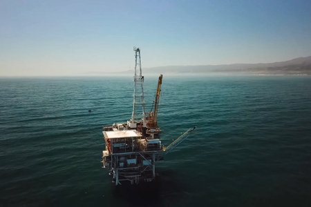 Drilling platform in the port. Towing of the oil platform.