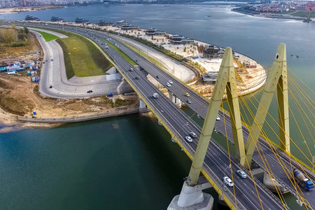 Beautiful bridge over the river. The bridge on the cables is road.