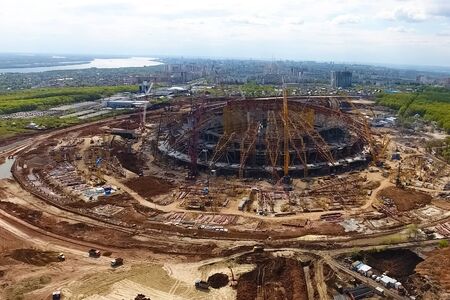Moscow, Russia - May 12, 2018: Equipment for the construction of the stadium. Tower cranes and construction machinery. Construction of the stadium.の写真素材