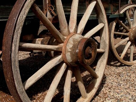 Antique wooden stagecoach wheelの写真素材
