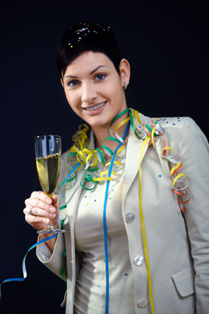 Young women with champagne fulte in hand.