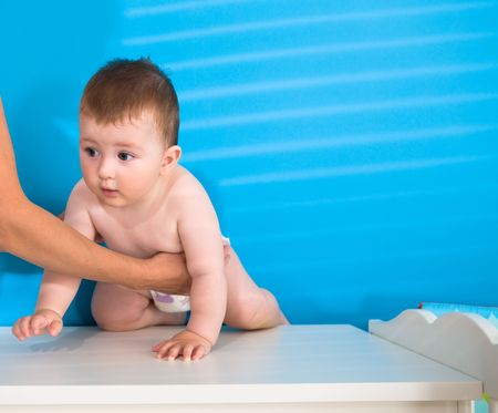 Cute baby boy ( 1 year old ) at home.の写真素材