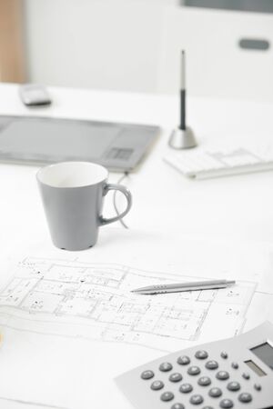 Close-up photo blueprint on office desk.の写真素材