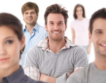 Group portrait of happy young people together, looking at camera, smiling.ï¿½の写真素材