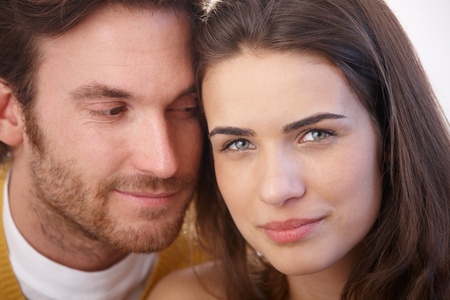 Closeup portrait of young loving couple, smiling.の写真素材