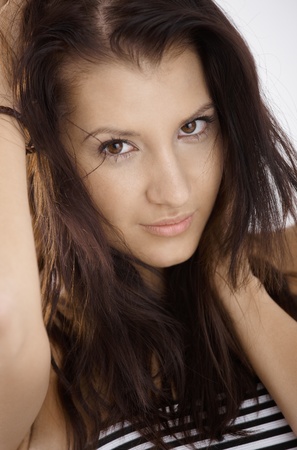 Closeup portrait of young female, looking at camera.の写真素材