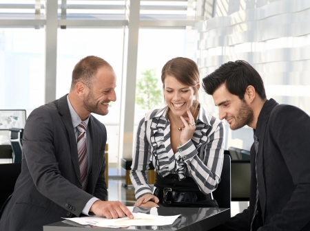 Happy business people working in team at office.の写真素材