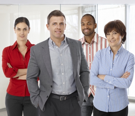 Diverse team of smiling office workers. Boss and employees of successful casual small business.の写真素材