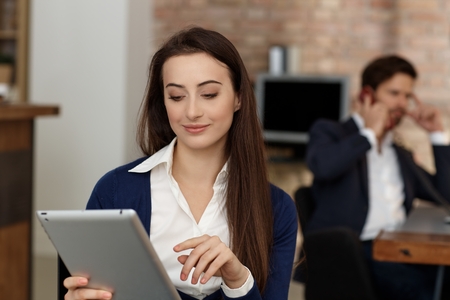 Portrait of young businesswoman with tablet.の写真素材