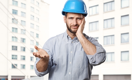 Thoughtful engineer having a problemの写真素材