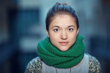 Closeup portrait of young woman on a cold day.の写真素材