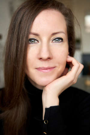 Portrait of a young white woman smilingの写真素材