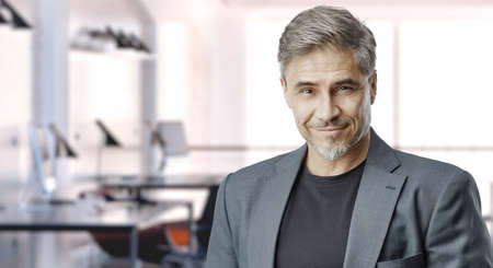 Older businessman in officeの写真素材