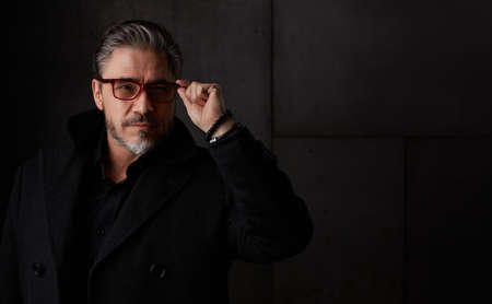 Portrait of older man in 50s in glassesの写真素材