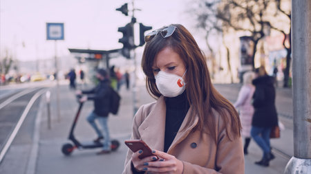 Woman in face mask coronavirus covid-19 protectionの写真素材